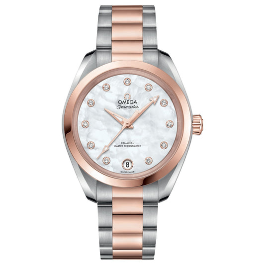 The OMEGA Seamaster Aqua Terra 150M Co-Axial Master Chronometer 34mm Watch is a luxurious wristwatch featuring a two-tone metal strap in silver and rose gold. Its round face includes a mother-of-pearl dial, rose gold hour markers adorned with diamond accents, and showcases the sophisticated Aqua Terra design. The watch also features a date display at the 6 o'clock position and is powered by the Co-Axial Master Chronometer calibre 8800.