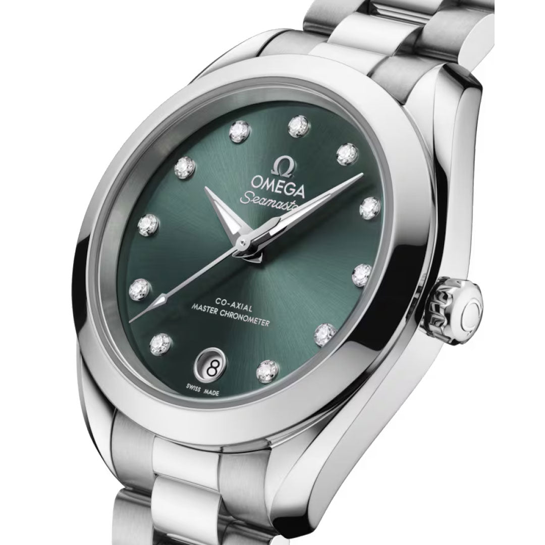 Close-up of the OMEGA Seamaster Aqua Terra 150M Co-Axial Master Chronometer 30mm Watch featuring a green dial, diamond hour markers, date window at 6 o’clock, silver stainless steel bracelet, and OMEGA branding on the face.