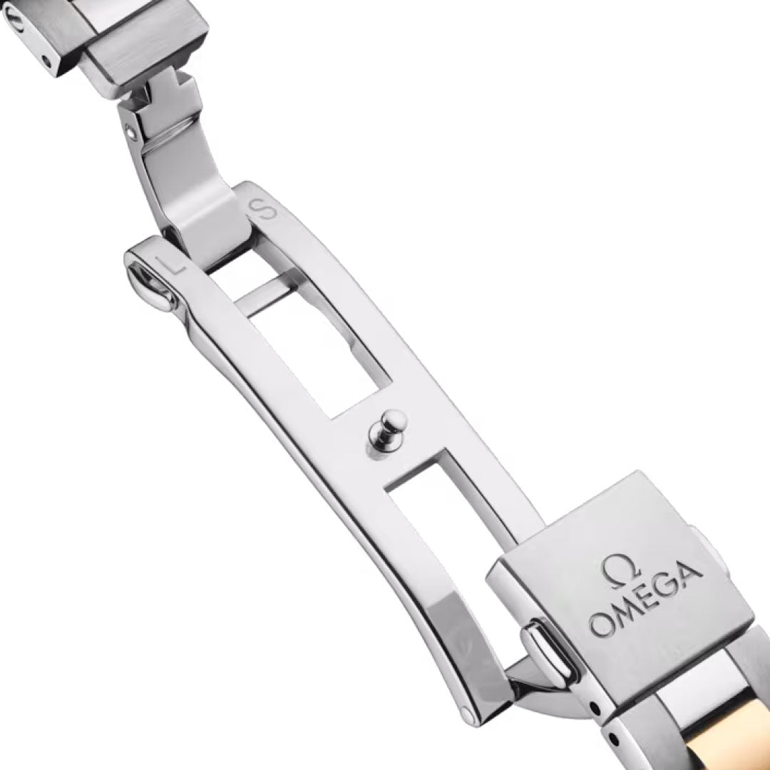 A close-up of the OMEGA Seamaster Aqua Terra 150M Co-Axial Master Chronometer 30mm Watch clasp highlights the engraved OMEGA logo and detailed locking mechanism in its stainless steel design.