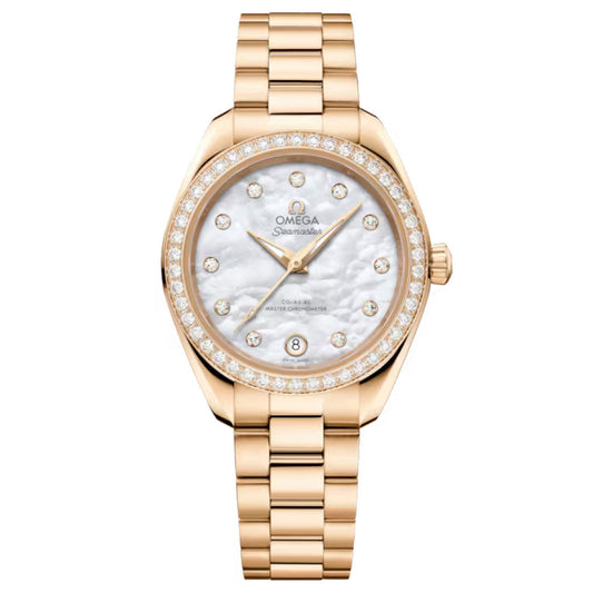 The OMEGA Seamaster Aqua Terra 150M Co-Axial Master Chronometer 30mm Watch in Moonshine gold features a mother-of-pearl dial with diamond hour markers, diamond bezel, date at 6 o’clock, and a matching gold bracelet.