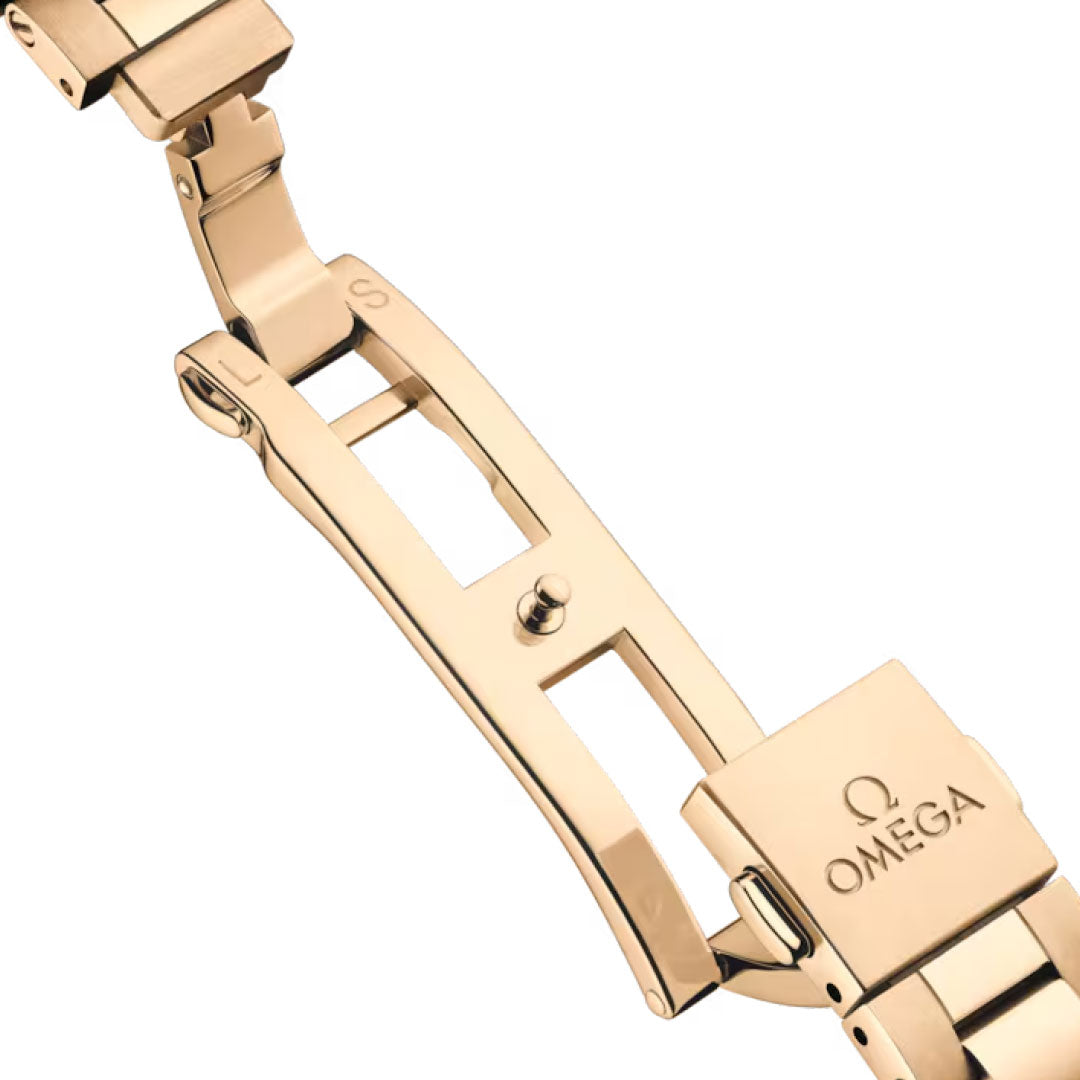 Close-up of the OMEGA Seamaster Aqua Terra 150M Co-Axial Master Chronometer 30mm watch clasp, showing the OMEGA logo and detailed craftsmanship on its rose gold metal components.