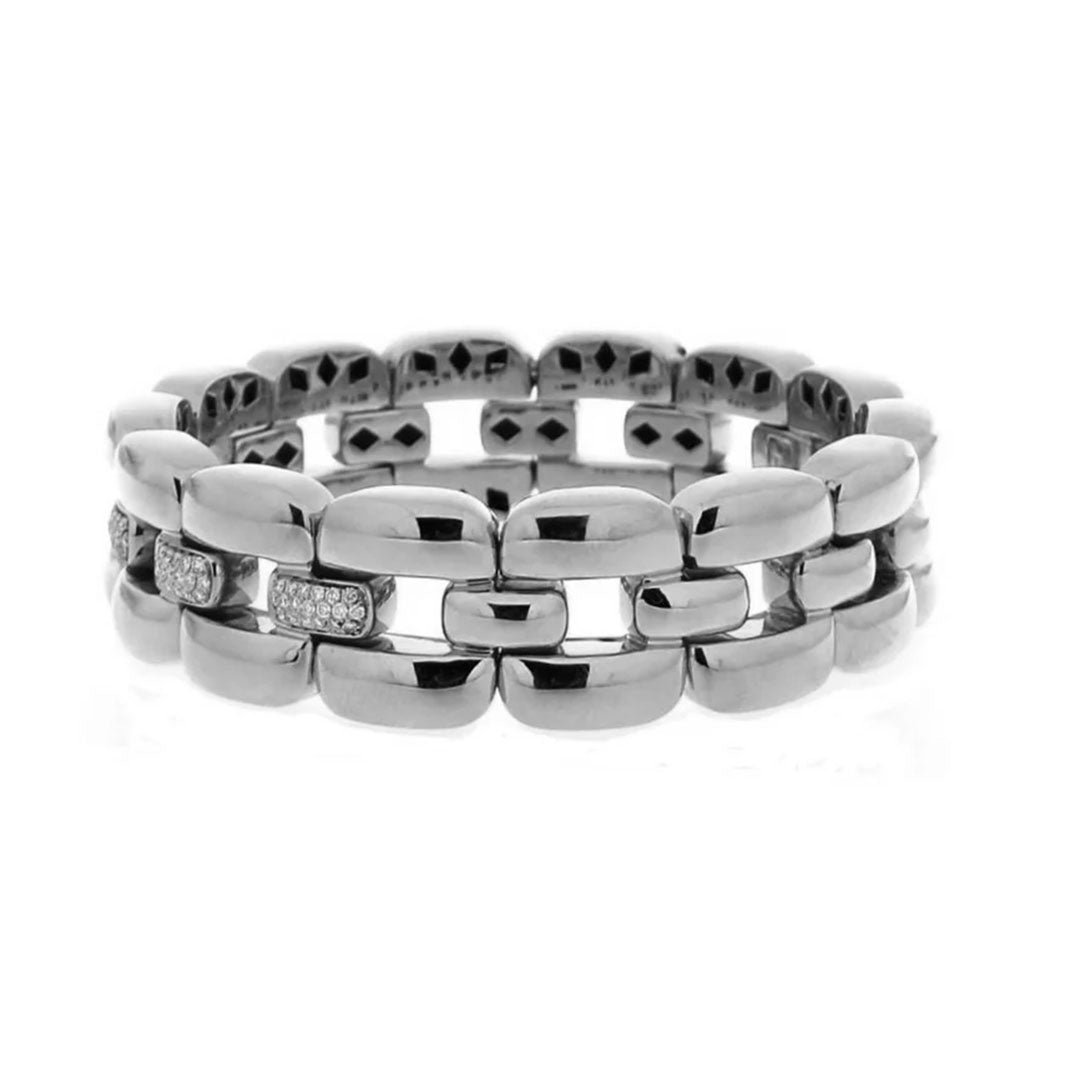 The Hulchi Belluni Tresore 18K White Gold Diamond Bracelet features chunky, rectangular links accented with round brilliant diamonds totaling 0.28 CTW, shown on a white background.