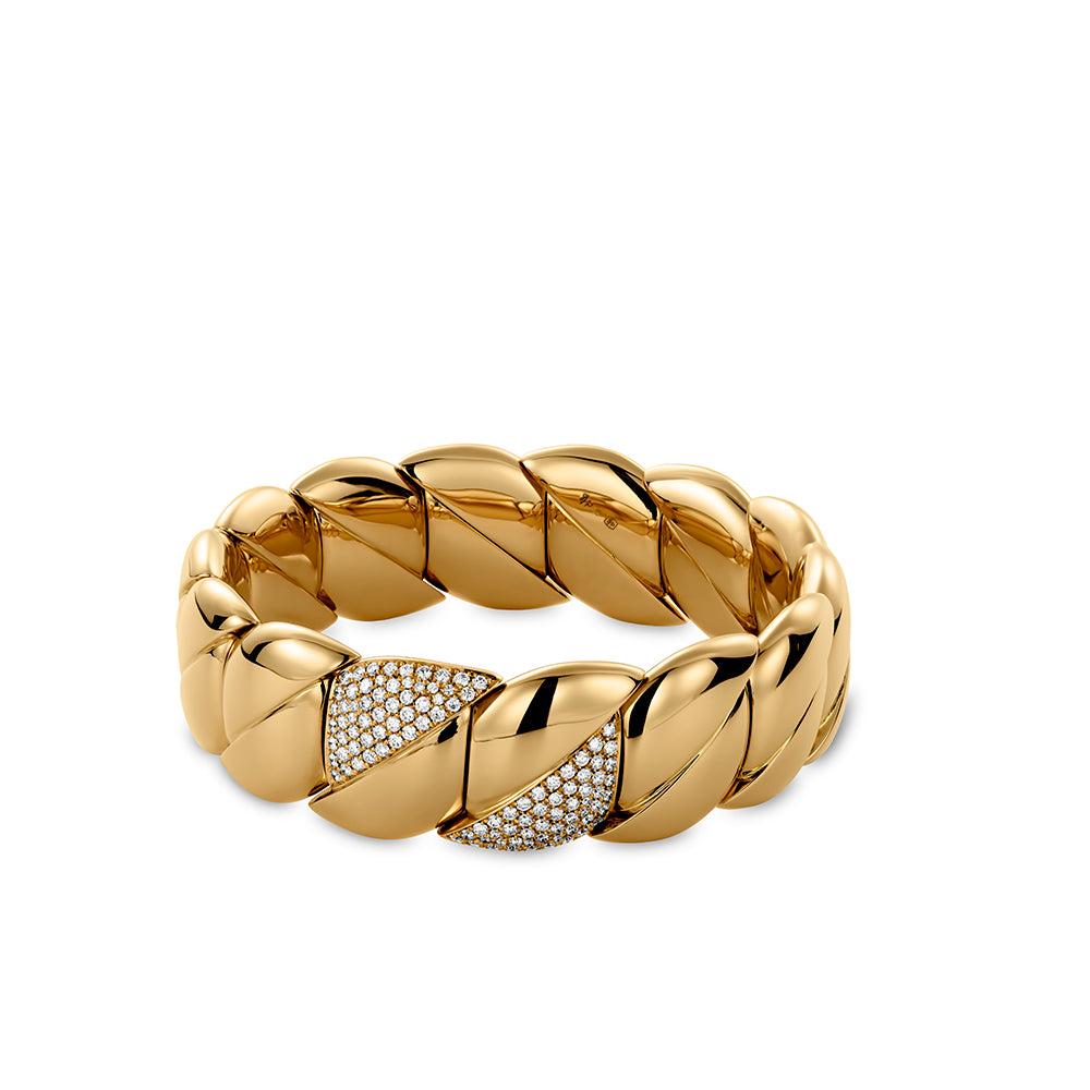 The Hulchi Belluni Tresore 18K Yellow Gold Diamond Bracelet by Hulchi Belluni features large, interlocking leaf links—one set with 1.10 CTW round brilliant diamonds and a black accent—shown on a white background.