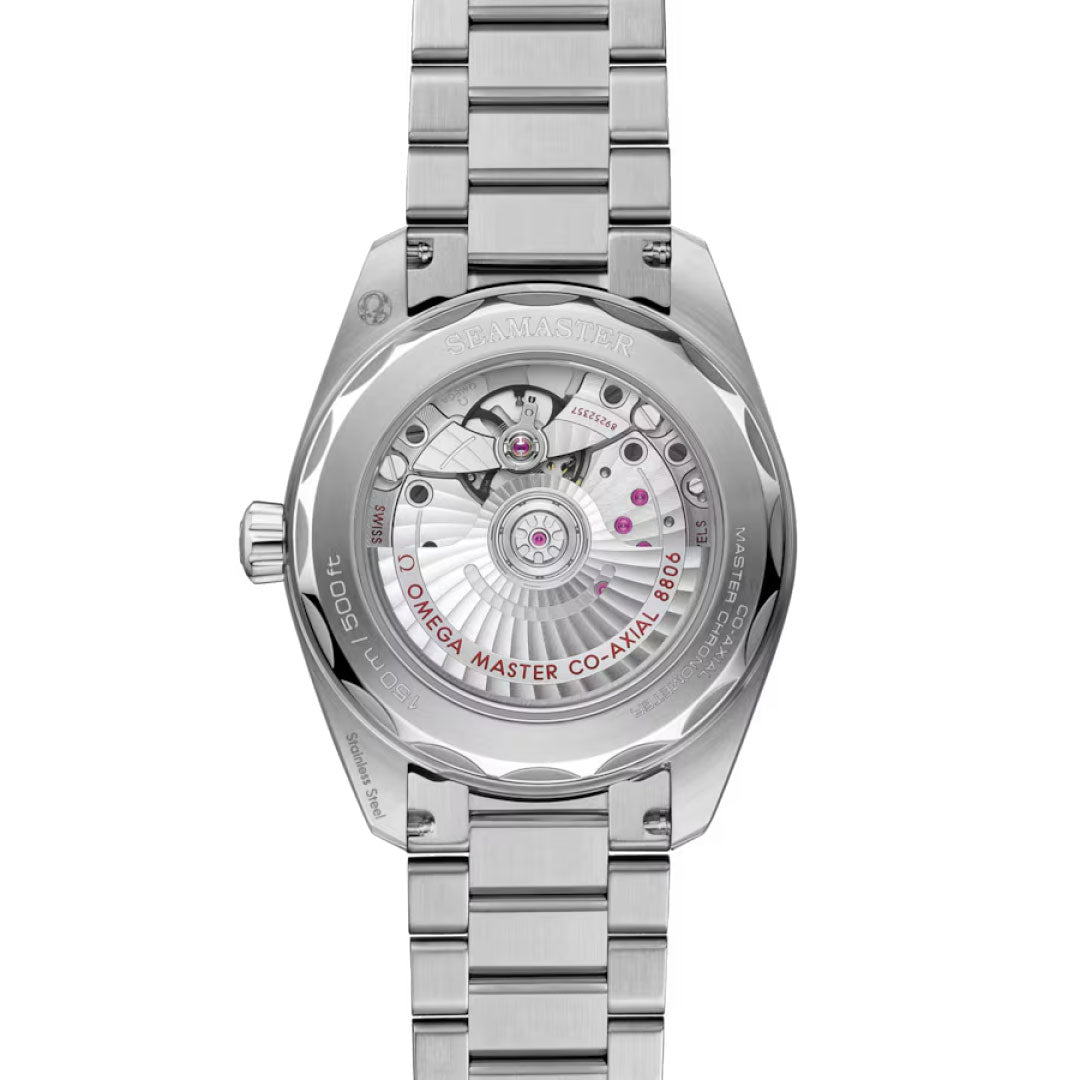 The image shows the back view of the OMEGA Seamaster Railmaster Co-Axial Master Chronometer 38mm, featuring its detailed automatic movement visible through a sapphire case back with “Omega Master Co-Axial 8800” inscribed on the movement.