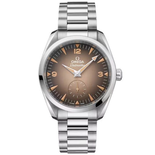 The OMEGA Seamaster Railmaster Co-Axial Master Chronometer 38mm Watch features a stainless steel case, gradient brown dial with luminous hands, Arabic numerals at 3, 6, 9, and 12, and a steel link bracelet.
