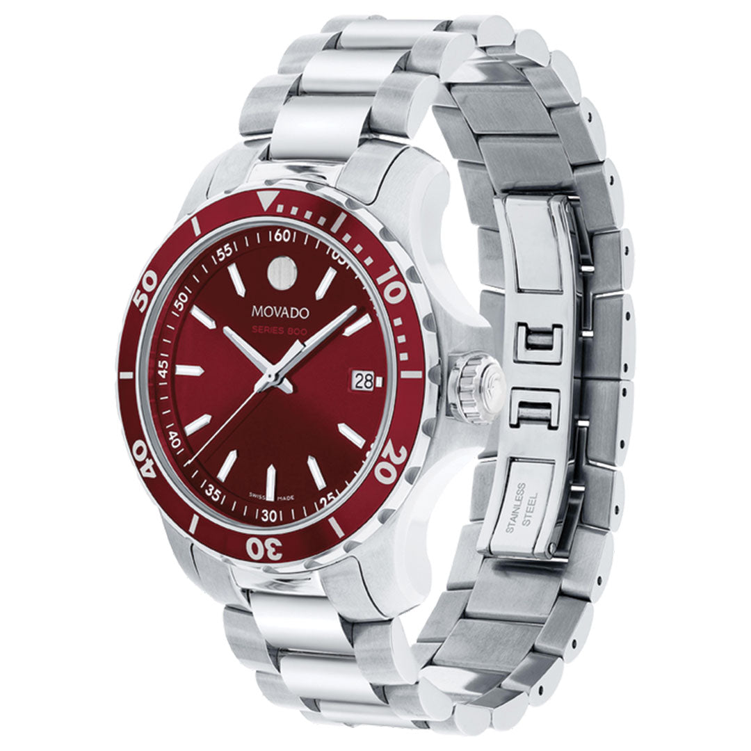 The Movado Series 800 Quartz 40mm Watch features a silver stainless steel sport design, red unidirectional bezel and dial, white Super-LumiNova hour markers and hands, and a date display at 3 o’clock. Brand: Movado.