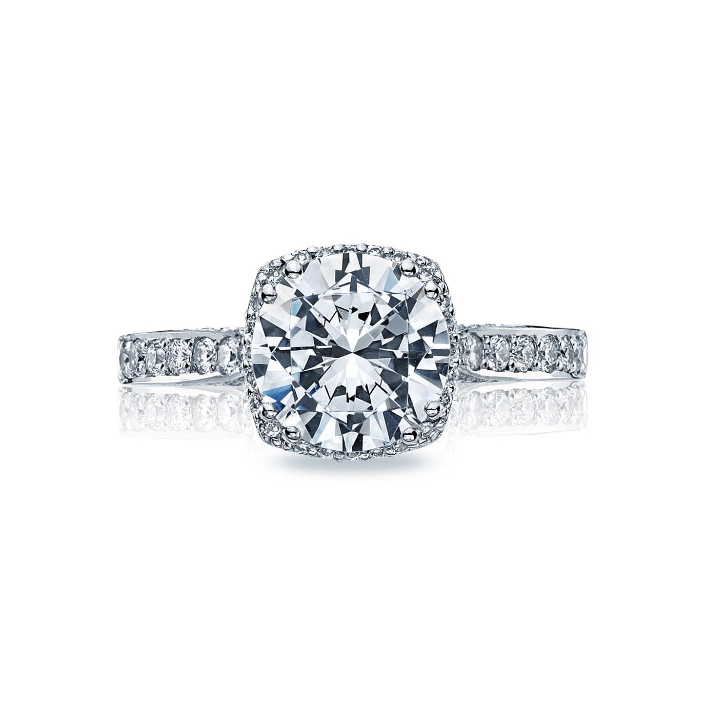 The Tacori Dantela 18K White Gold Round Brilliant Semi Mount Engagement Ring is an exquisite choice, featuring a central setting designed for a large round diamond. It showcases a beautiful diamond-adorned band and includes Tacori's signature hidden halo that adds an extra layer of sparkle, enhancing its allure among engagement rings.