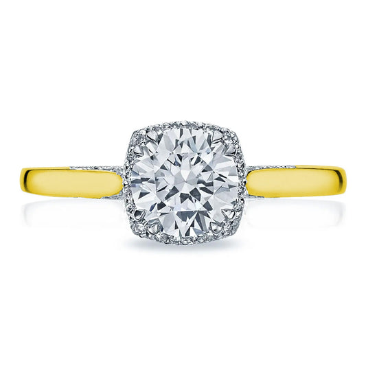 Explore the Tacori Dantela 18K Yellow Gold Round Brilliant Semi Mount engagement ring, showcasing a striking solitaire diamond at its core, surrounded by a stunning hidden halo of smaller diamonds. The smooth-finished gold band beautifully enhances the sparkle of the diamonds.