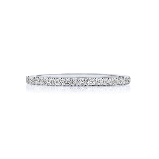 The Tacori Sculpted Crescent 18K White Gold Round Brilliant Diamond Anniversary Ring features a delicate design with a continuous row of small, sparkling diamonds, perfect for discerning engagement ring enthusiasts. Set against a plain white background, its exquisite artistry shines through.