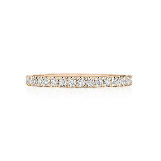 A rose gold band embellished with a line of closely set, sparkling pink sapphires exudes an elegant and shimmering effect. Ideal for those looking for timeless anniversary rings, this piece embodies the essence of Tacori's renowned craftsmanship.