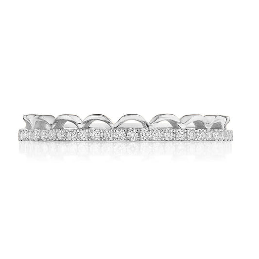 A sophisticated Tacori Crescent Crown anniversary ring in 18K white gold, showcasing a row of small, brilliant round diamonds adorning its circumference. The Sculpted Crescent detailing on the top edge lends a lace-like appearance, akin to a diadem wedding band, set against a plain white backdrop.