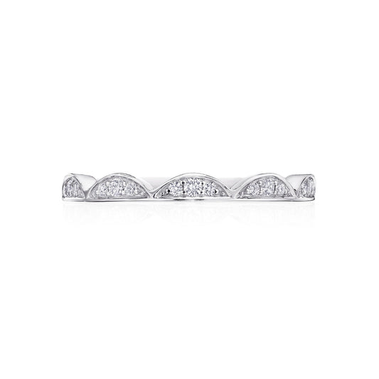 Introducing the Tacori Crescent Crown 18K White Gold Round Brilliant Diamond Anniversary Ring, a finely crafted piece that embodies elegance with its scalloped design and small embedded diamonds. Reminiscent of the classic TACORI engagement rings, the ring features the iconic Signature Crescent set against a lustrous white gold backdrop.