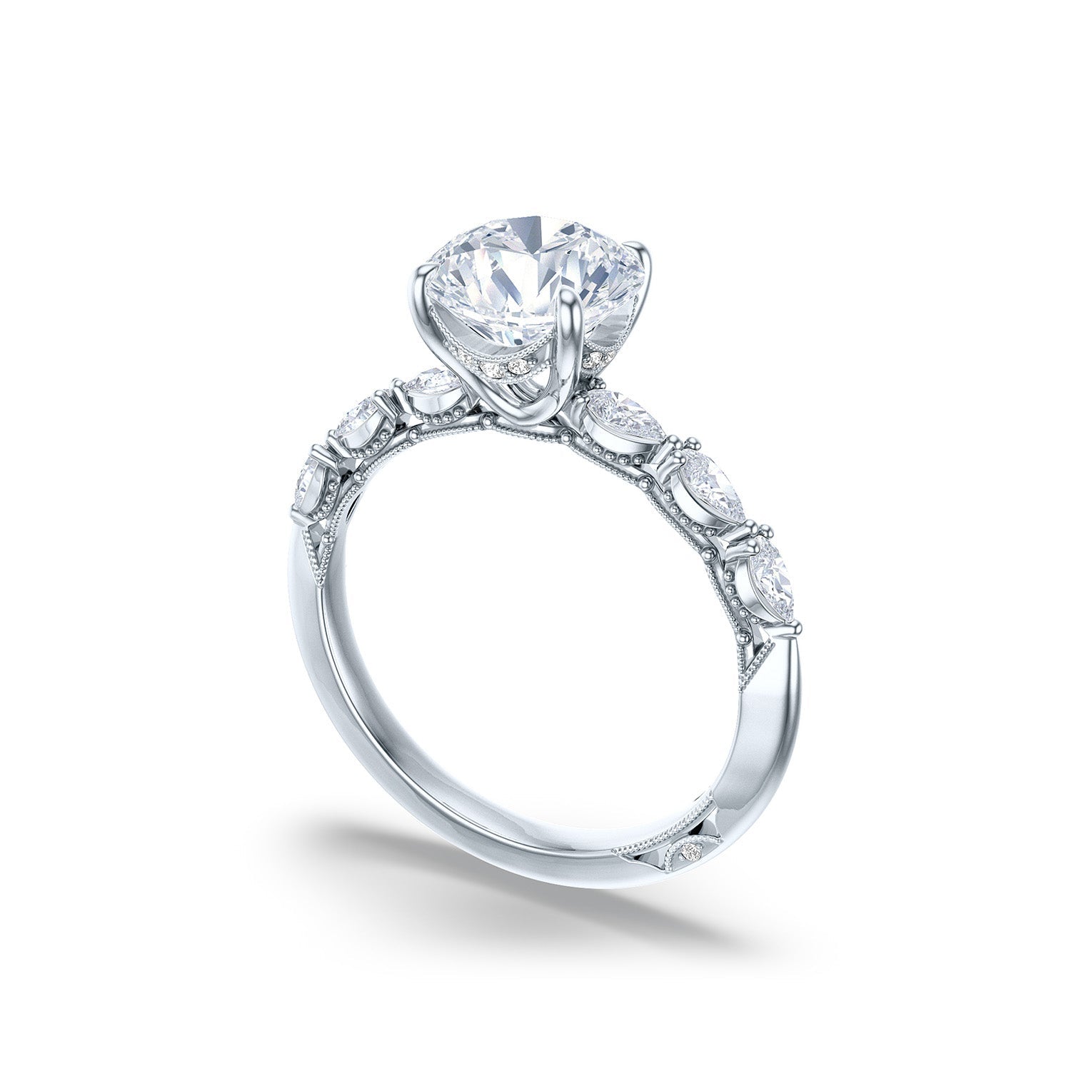 The Tacori Sculpted Crescent 18K White Gold Round Brilliant Solitaire Semi Mount Engagement Ring with Diamond Band, crafted by Tacori gemologists, showcases a large round diamond at its center with smaller diamonds embedded along the band. The piece is elegantly displayed on a plain white background.