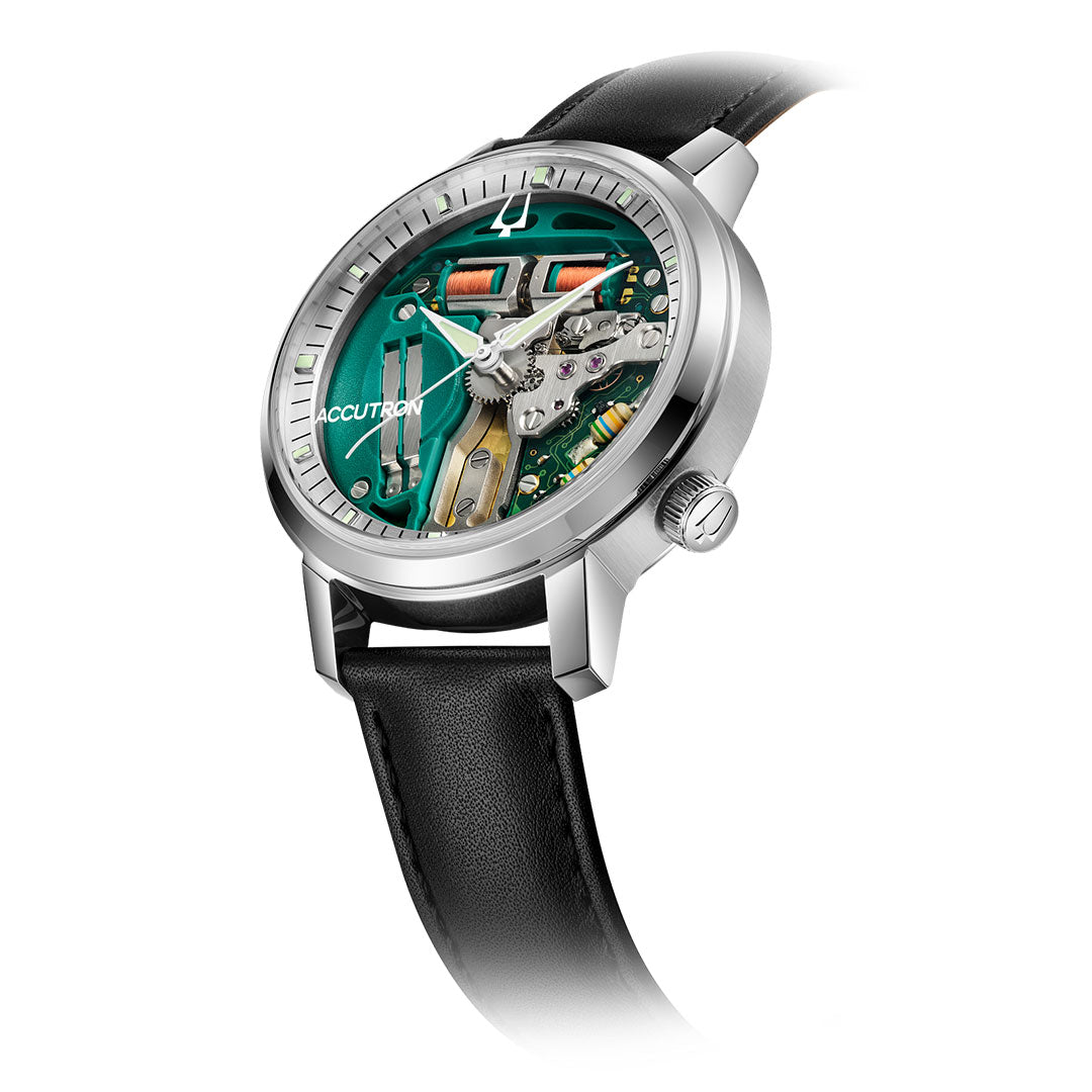 The Accutron Spaceview 314 Tuning Fork Quartz 39mm Watch features a black leather strap, silver case, and an exposed green and gold mechanism visible through its transparent sapphire crystal face.