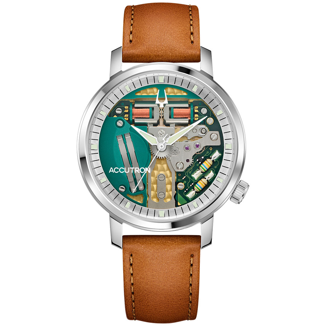 The Accutron Spaceview 314 Tuning Fork Quartz 39mm Watch features a brown leather band, silver 904L stainless steel case, and an exposed green and metallic dial mechanism with "ACCUTRON" on the left side, echoing its iconic design.