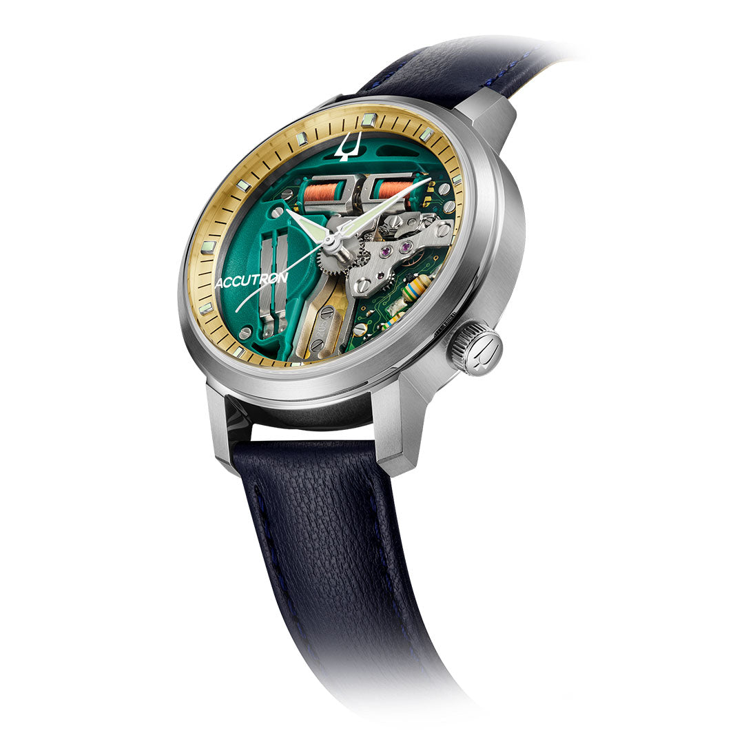 A close-up of the Accutron Spaceview 314 Tuning Fork Quartz 39mm Watch by Accutron, featuring a green and gold open-worked dial, silver case, and dark leather strap that showcases its intricate tuning fork technology.