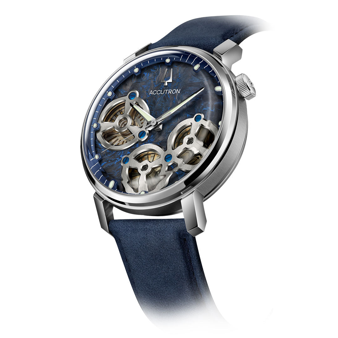 The Accutron Spaceview Evolution Electrostatic 43.5mm Watch by Accutron features a blue marbled dial, visible internal gears with electrostatic movement, a silver case, and blue leather strap, displayed at an angle on a white background.