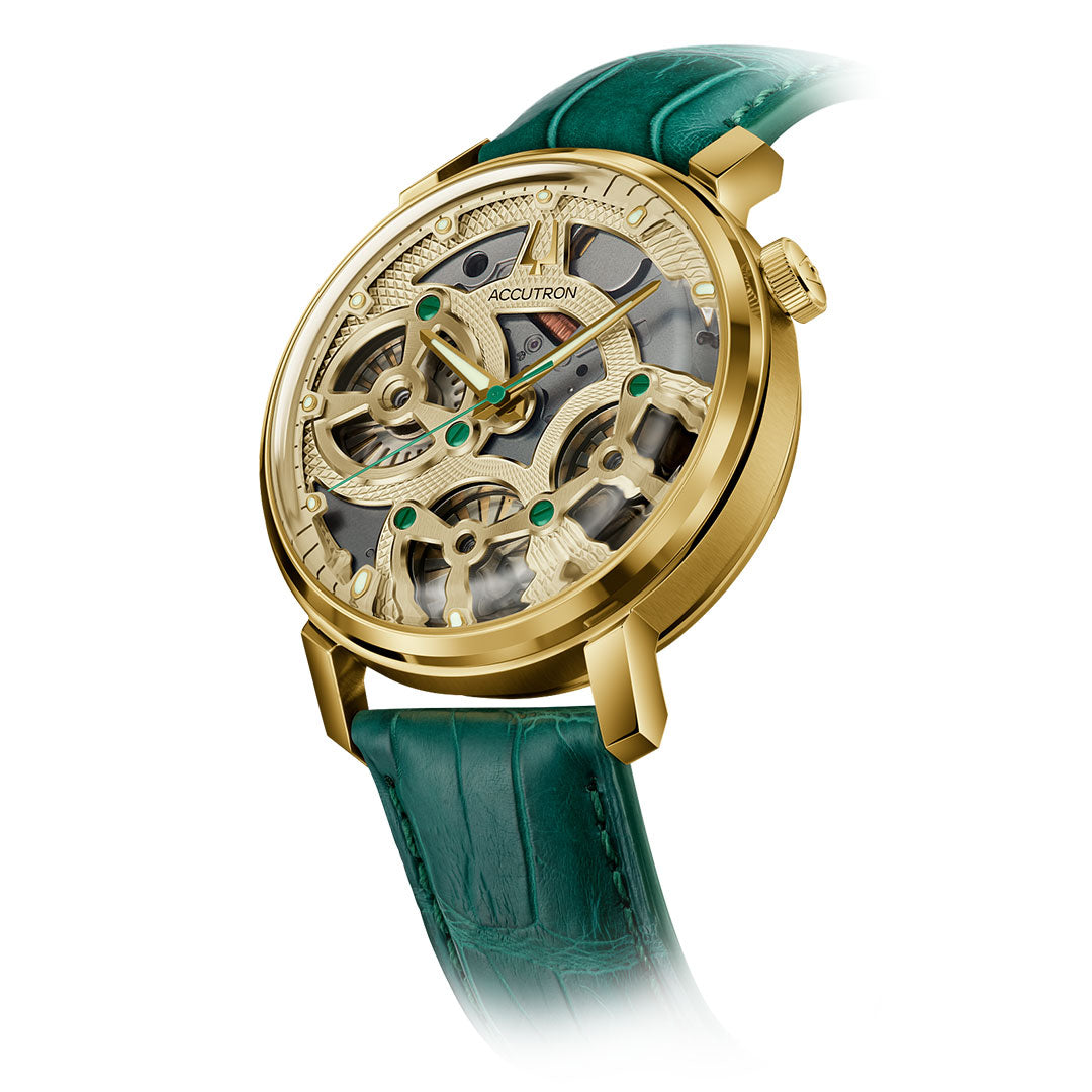 The Accutron Spaceview Evolution x La Palina Goldie Electrostatic 43.5mm Watch features a gold-plated skeleton case, visible gears, and a green leather strap, displayed at an angle on a white background.