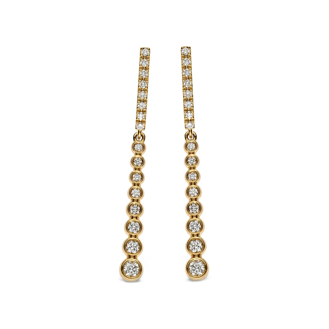 Introducing the Leo Pizzo Bubble Collection 18K Yellow Gold Diamond Drop Earrings: beautifully crafted in 18kt yellow gold, these earrings feature a linear design with natural diamonds that increase in size toward the bottom, creating a captivating shimmer.