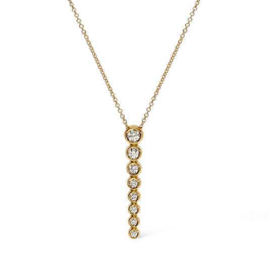 The Leo Pizzo Bubble Collection necklace by Leo Pizzo is an 18K yellow gold piece featuring a vertical pendant with eight natural diamonds in gold bezels, decreasing in size along a delicate chain.