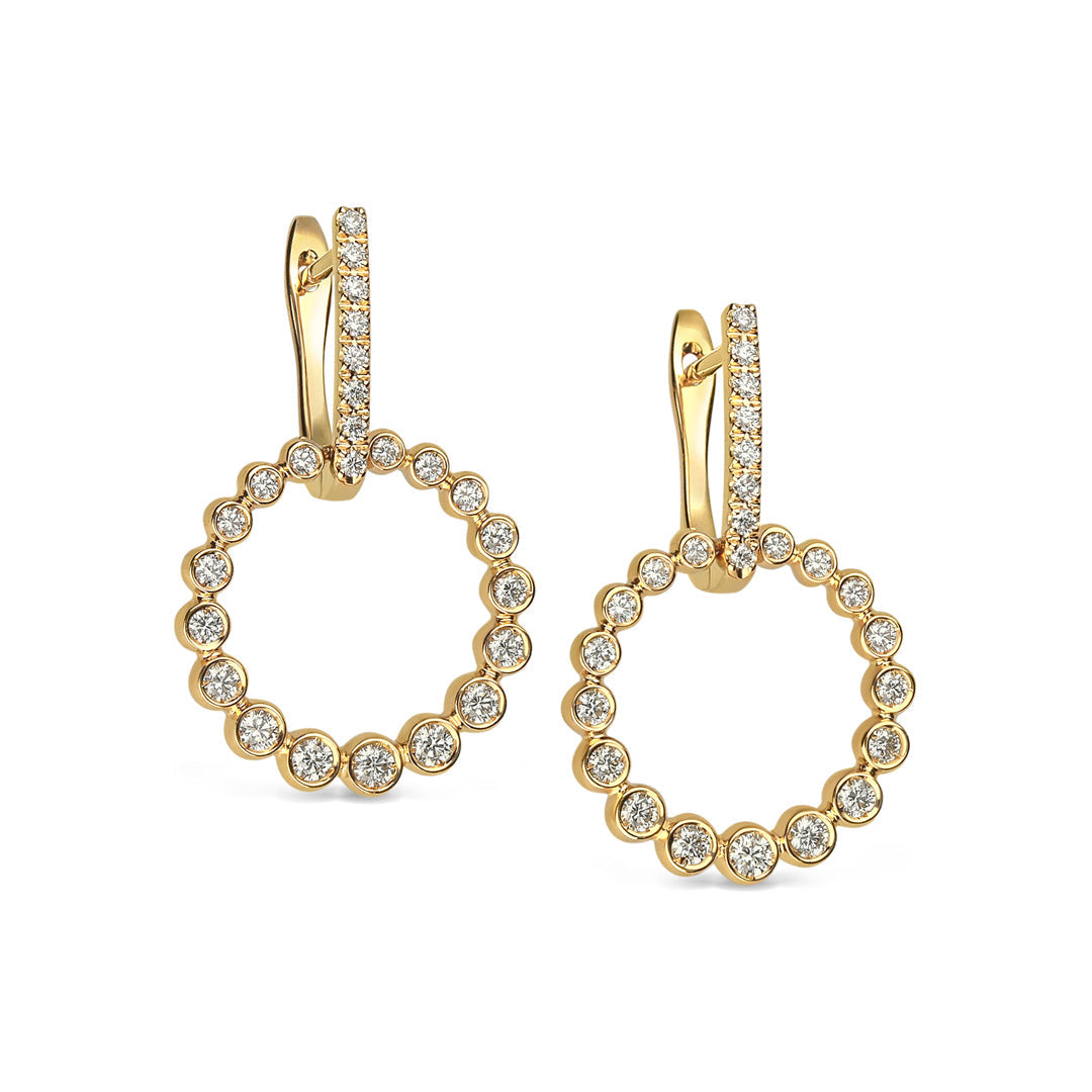 Discover the Leo Pizzo Bubble Collection: elegant 18K yellow gold diamond drop earrings featuring circular hoops with natural diamonds and a sleek, shiny clasp for added sophistication.