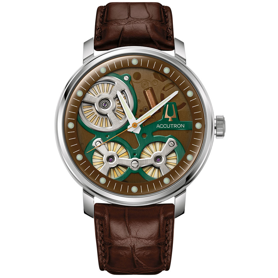 The Accutron Spaceview 2020 Electrostatic 43.5mm Watch features a brown leather strap, silver case, visible green and gold mechanical movement, numeral-free face, and the Accutron logo amid intricate gears—modern inspiration from the celebrated original.