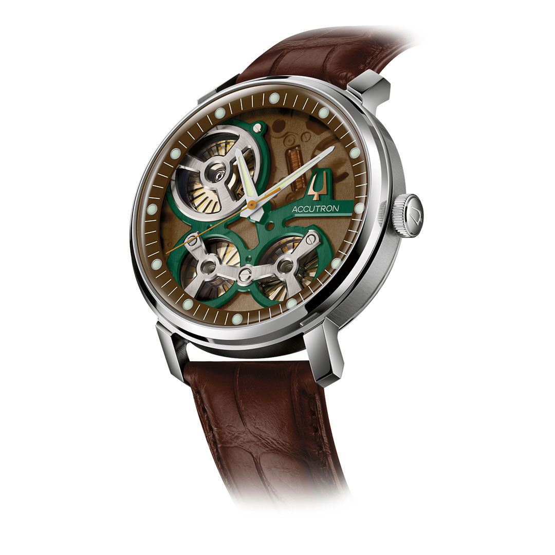 The Accutron Spaceview 2020 Electrostatic 43.5mm Watch by Accutron features an open skeleton dial, visible gears, green accents, and a brown leather strap, displayed on a white background.