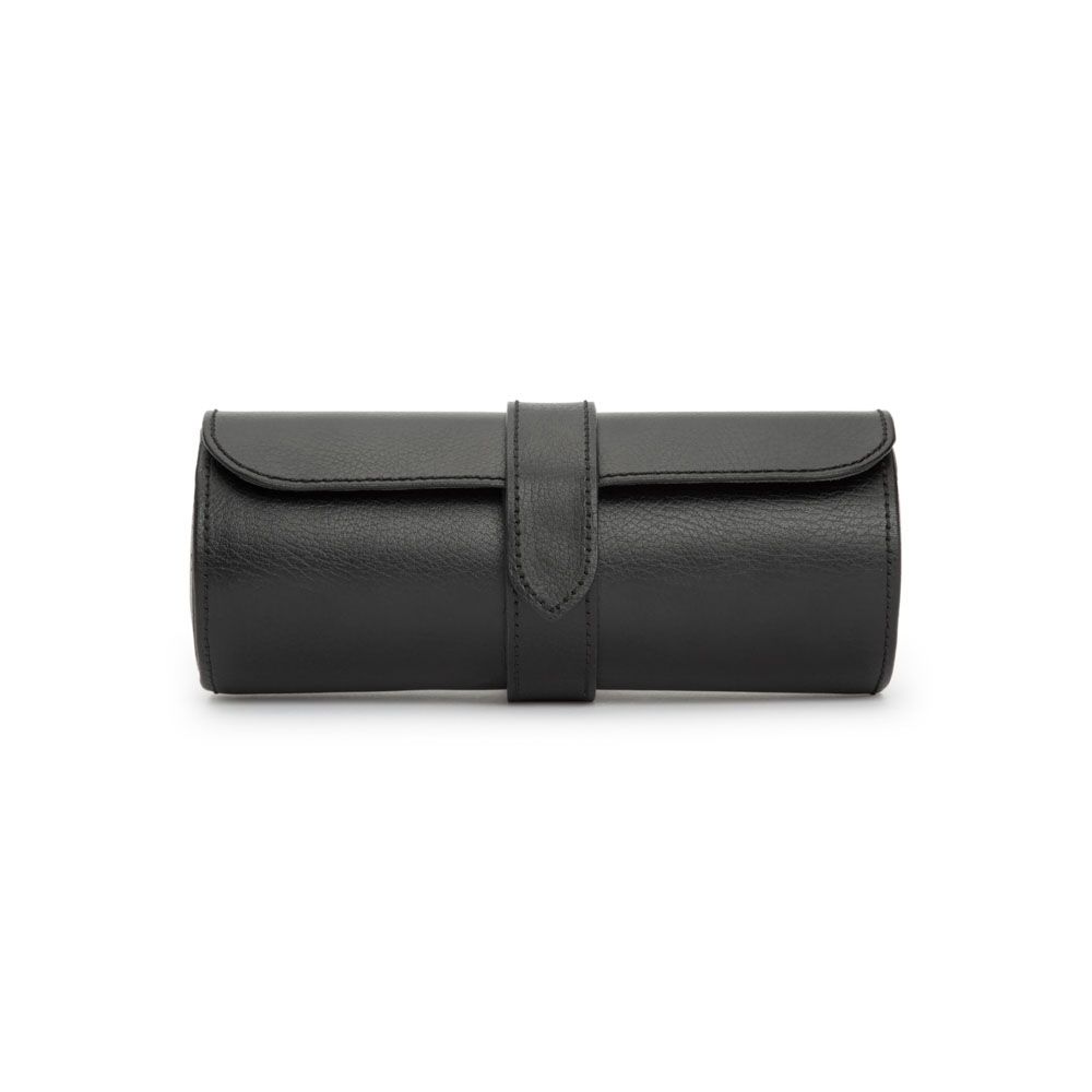 The WOLF 1834 Watch Roll Blake With Capsule in Black/Grey, a cylindrical leather case by WOLF featuring a flap closure and strap, is elegantly handcrafted for functionality and style, displayed against a white background.
