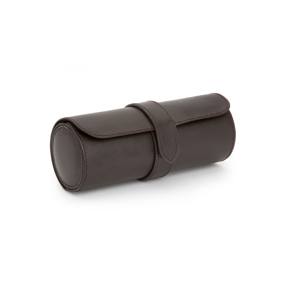The WOLF 1834 Blake Triple Watch Roll in brown is a handcrafted leather cylindrical case featuring a rich hue, flap closure, and strap—perfect for storing watches or jewelry. Presented elegantly on a white background, this accessory showcases the refined quality of WOLF.