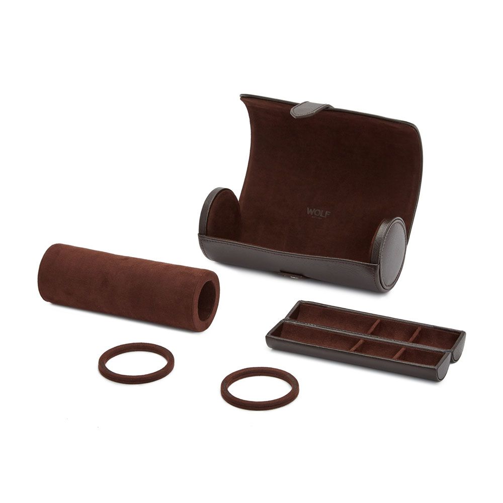 A brown suede and leather watch roll, open with its parts displayed—the outer case, a cylindrical roll, two end rings, and a tray with compartments. The WOLF 1834 Blake Triple Watch Roll Brown by WOLF blends refined design with practical organization to securely store your timepieces.