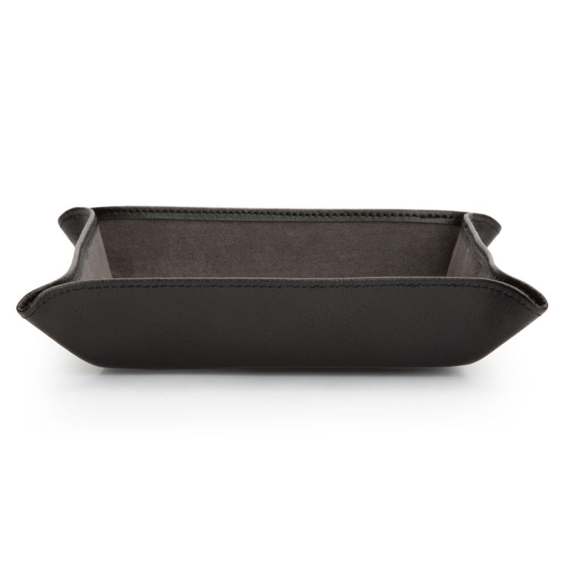 The WOLF 1834 Blake Coin Tray, crafted from black leather with slightly raised corners and a smooth interior surface, rests elegantly against a plain white background.