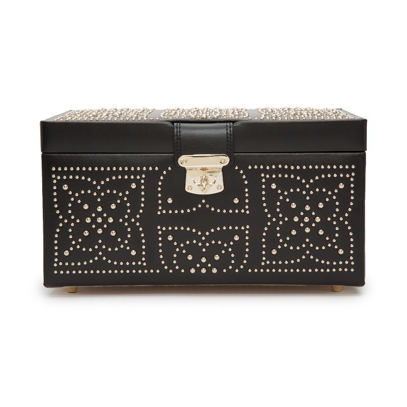 The WOLF 1834 Marrakesh Black Jewellery Box by WOLF is elegantly wrapped in leather with gold studding, featuring intricate floral motifs on both the front and top. Its central gold latch enhances the sophisticated design, while the LusterLoc™ technology inside ensures your treasures remain pristine.
