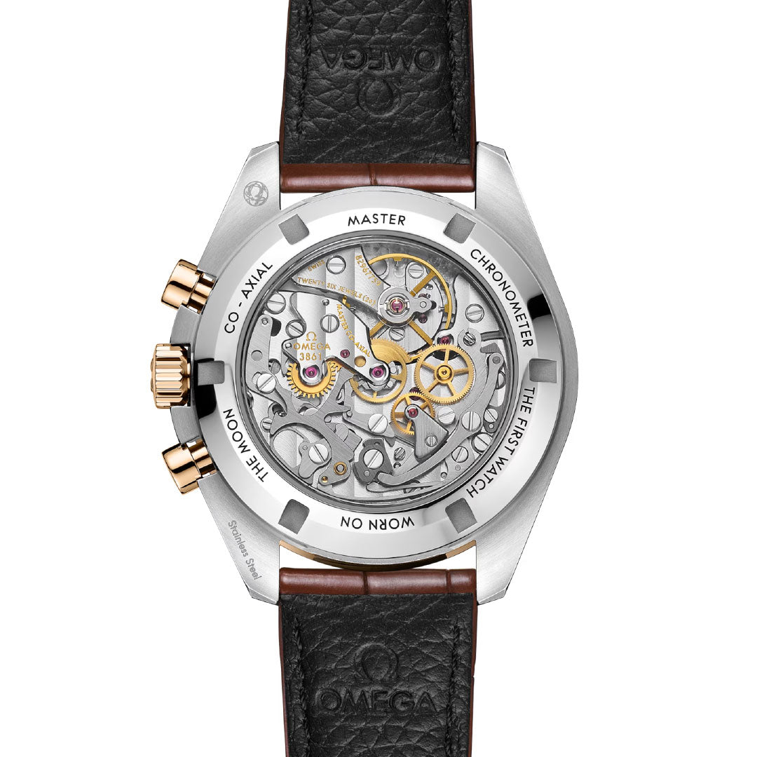 Back view of the OMEGA Speedmaster Moonwatch Professional Co-Axial Master Chronometer Chronograph 42mm, featuring a leather strap, exposed mechanical movement, and engraved text like "Master Chronometer" and "The First Watch Worn on the Moon.