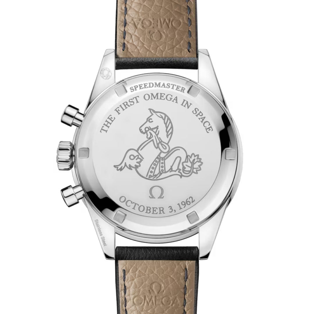 The OMEGA Speedmaster First OMEGA in Space Co-Axial Master Chronometer 39.7mm features a seahorse engraving, “THE FIRST OMEGA IN SPACE,” and “OCTOBER 3, 1962” on the case back, with a visible leather strap and metal casing.