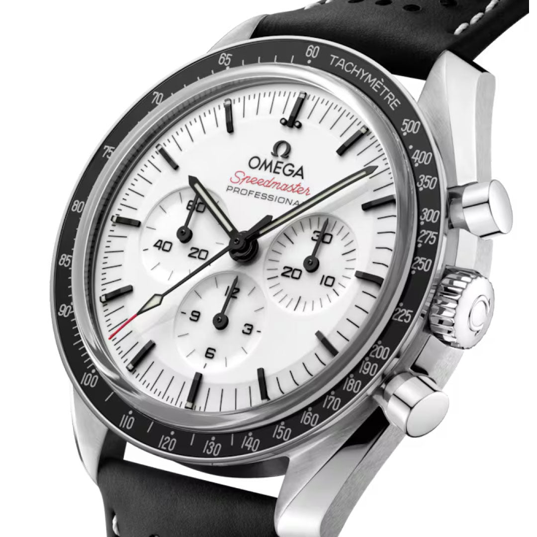 Close-up of the OMEGA Speedmaster Moonwatch Professional Co-Axial Master Chronometer Chronograph 42mm, featuring a white dial, black bezel, black leather strap, three subdials, tachymeter scale, and red “Speedmaster” text.