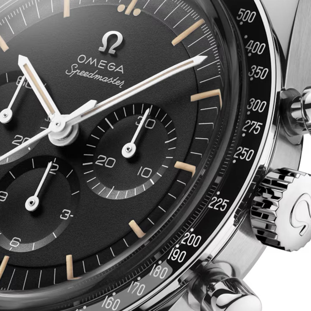 Close-up of the OMEGA Speedmaster Calibre 321 Chronograph Manual-Winding 39.7mm Watch, showing its black dial, three subdials, beige markers, tachymeter bezel, and vintage-inspired design featuring the iconic Calibre 321 movement.