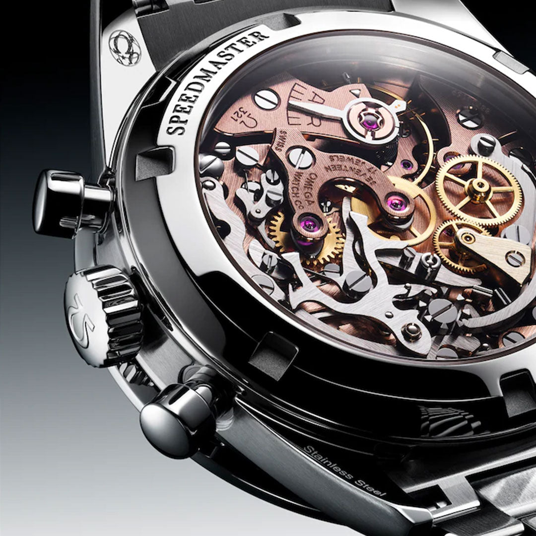 Close-up of the OMEGA Speedmaster Calibre 321 Chronograph Manual-Winding 39.7mm Watch, highlighting its intricate mechanical movement with visible gears and jewels inside a polished stainless steel case.