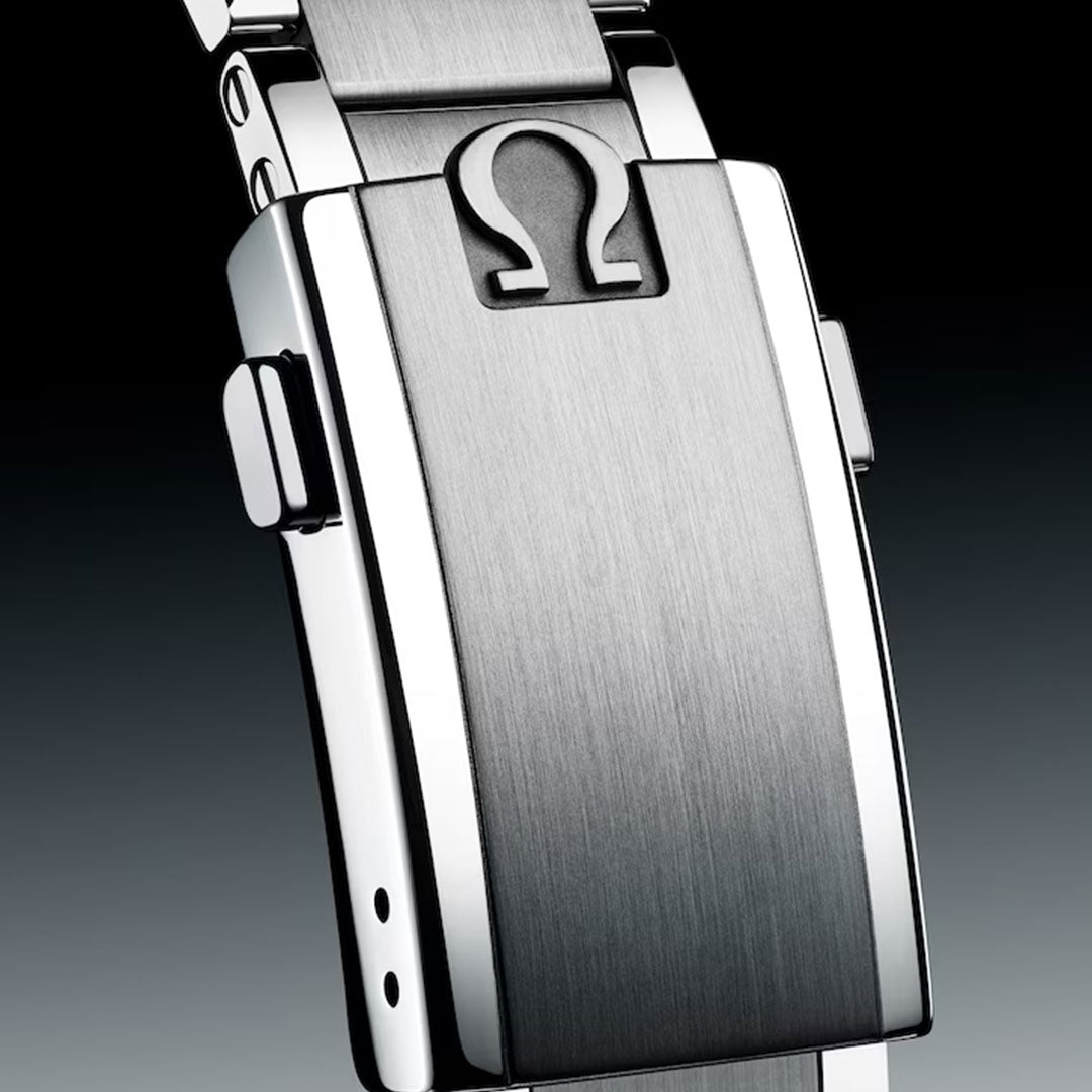 Close-up of the brushed stainless steel clasp on the OMEGA Speedmaster Calibre 321 Chronograph Manual-Winding 39.7mm, featuring engraved Omega logo, polished edges, and side push buttons.