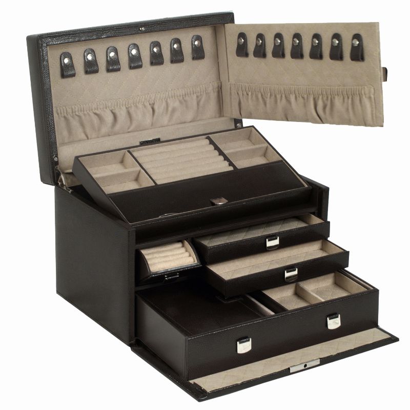 The WOLF 1834 London Medium Jewellery Box, crafted from black lizard-embossed leather, features an open lid that reveals multiple compartments for rings, necklaces, and other accessories. It includes pull-out drawers and a beige LusterLoc™ fabric interior with hooks for hanging items.