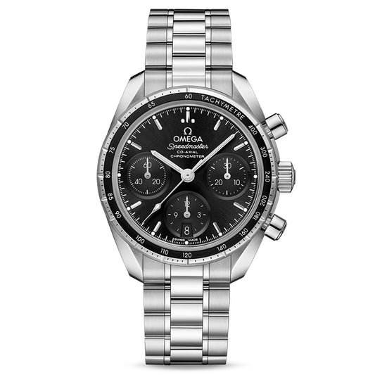 An OMEGA Speedmaster 38 Co-Axial Chronometer Chronograph 38mm watch in stainless steel, featuring a black dial with three sub-dials, a tachymetric scale on the bezel, a metal link bracelet, and notable crown and pushers on the side.