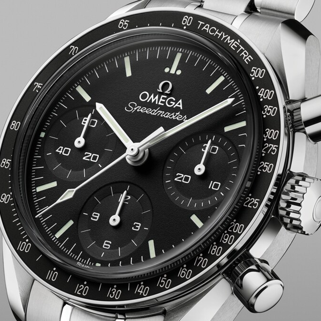 Stainless steel OMEGA Speedmaster 38 Co-Axial Chronometer Chronograph 38mm Watch with a black dial, three sub-dials, and a tachymeter scale on the bezel.