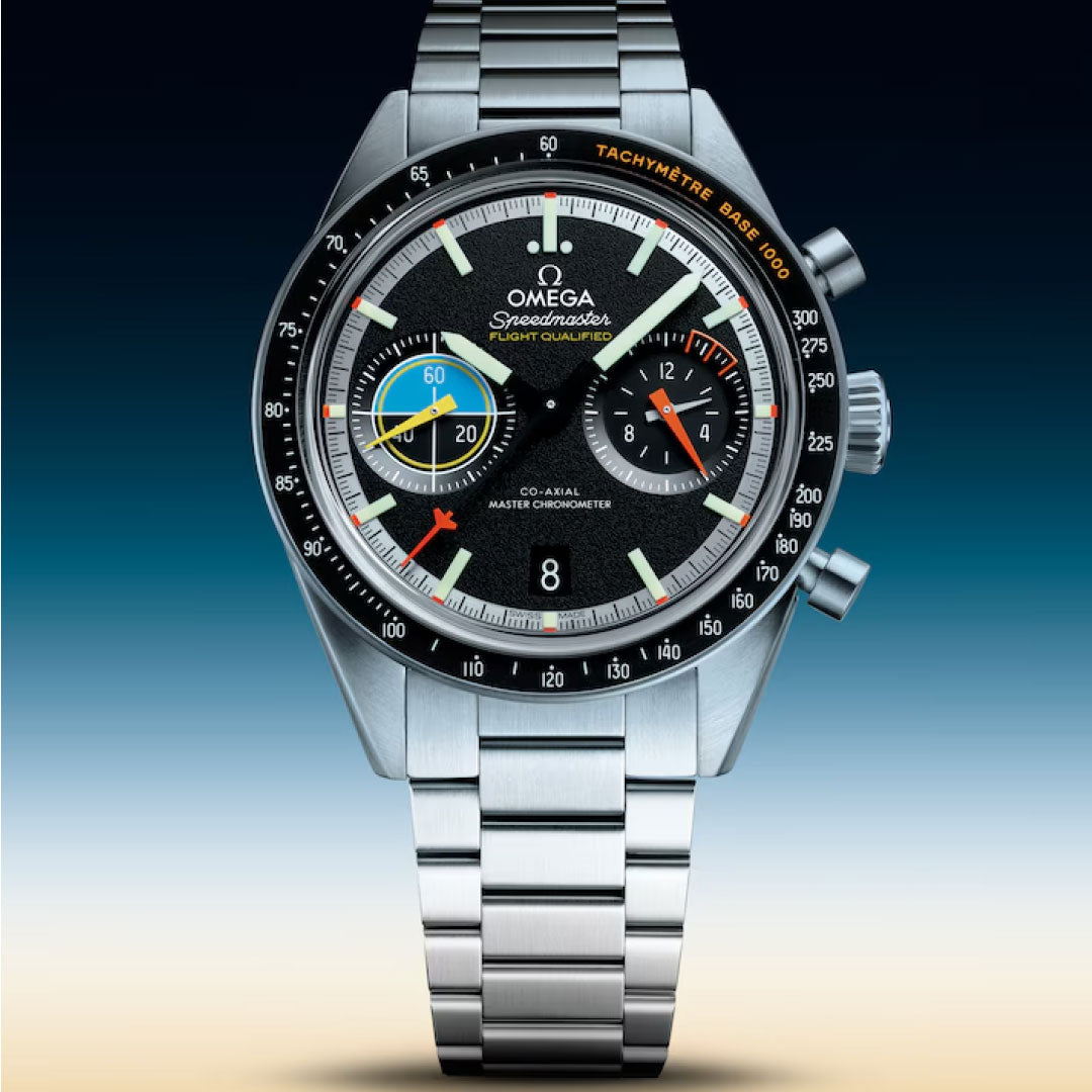 The OMEGA Speedmaster Pilot Co-Axial Master Chronometer 40.85mm Watch features a stainless steel case, black dial with vibrant subdials, date at 6 o’clock, and "Tachymètre Base 1000" bezel—honoring the moon landings.