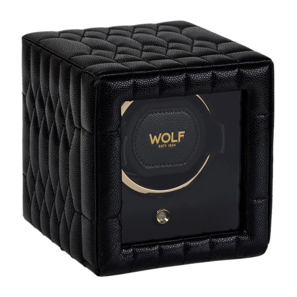 Introducing the WOLF 1834 Lauren Single Watch Winder Black: a black, quilted, cube-shaped watch winder by WOLF, featuring chrome finished hardware and a gold-ringed display window with the “WOLF EST. 1834” logo, accented by a small gold button at the front.