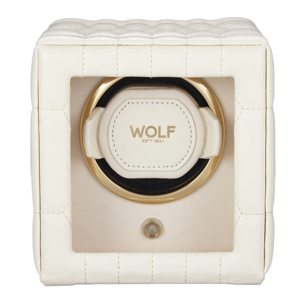 The WOLF 1834 Lauren Single Watch Winder Ivory features a white leather quilted exterior, a gold-trimmed circular opening with “WOLF EST. 1834” printed inside, elegant chrome hardware accents, and a small button beneath the opening.