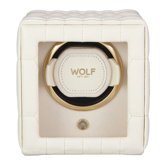 The WOLF 1834 Lauren Single Watch Winder Ivory features a white leather quilted exterior, a gold-trimmed circular opening with “WOLF EST. 1834” printed inside, elegant chrome hardware accents, and a small button beneath the opening.
