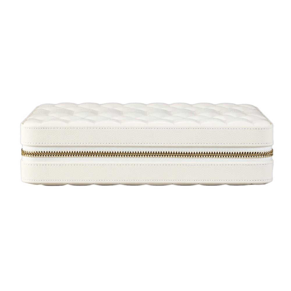 The WOLF 1834 Lauren Large Zip Case in ivory, a rectangular quilted white leather jewelry organizer by WOLF, features a gold zipper running around the middle and is shown closed against a plain white background.