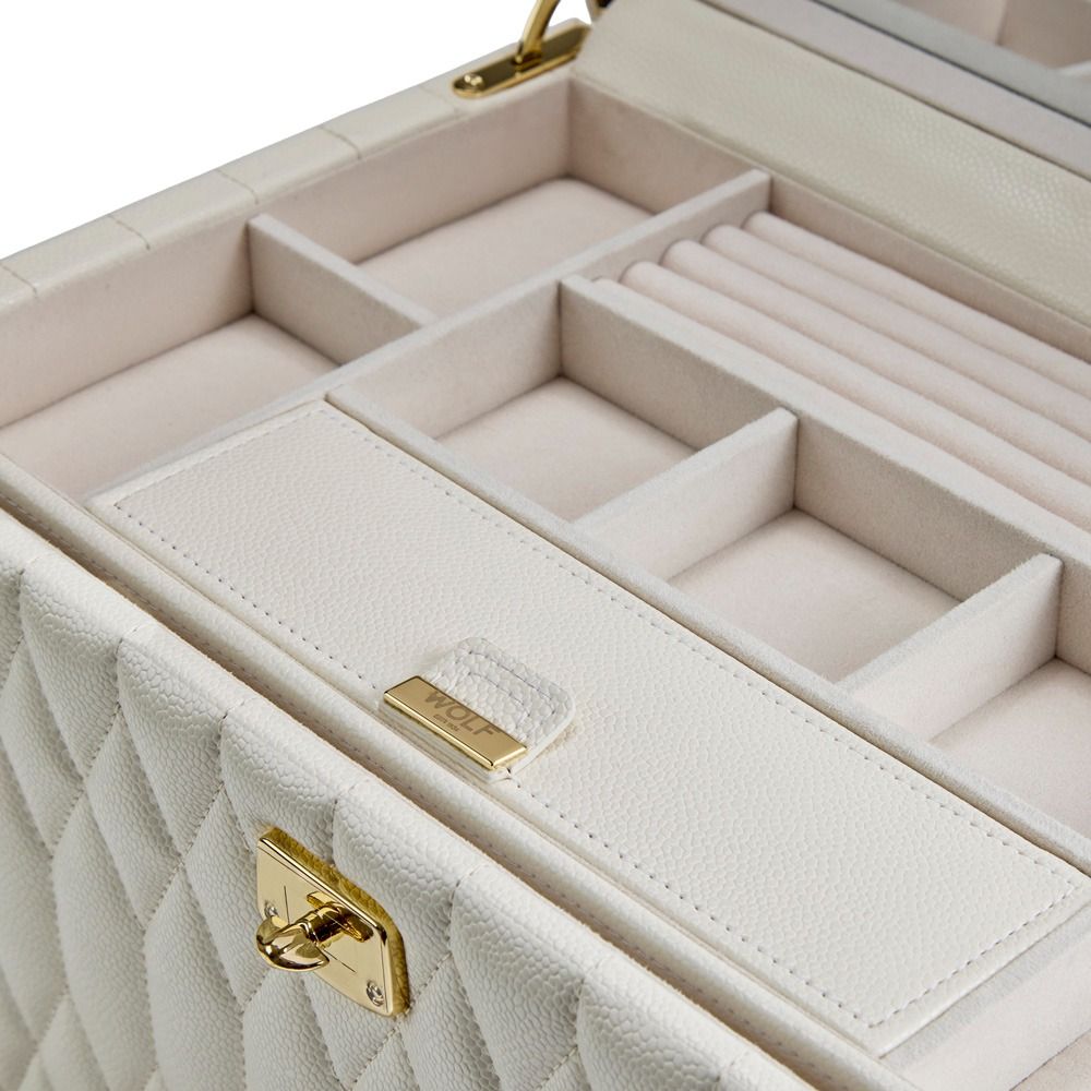 The WOLF 1834 Lauren Large Jewellery Box in Ivory features white diamond-quilted leather with a gold clasp, offering multiple padded compartments and slots to organize rings and accessories, expertly designed by WOLF for optimal tarnish prevention.