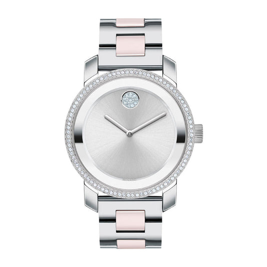 Introducing the Movado BOLD Ceramic Quartz 36mm Watch, a stylish timepiece from Movado. It showcases a minimalistic design with a round face and delicate silver hands set within a stainless steel case. A diamond-like marker elegantly adorns the 12 o'clock position, while its bracelet features alternating silver and pale pink links for an elegant touch.