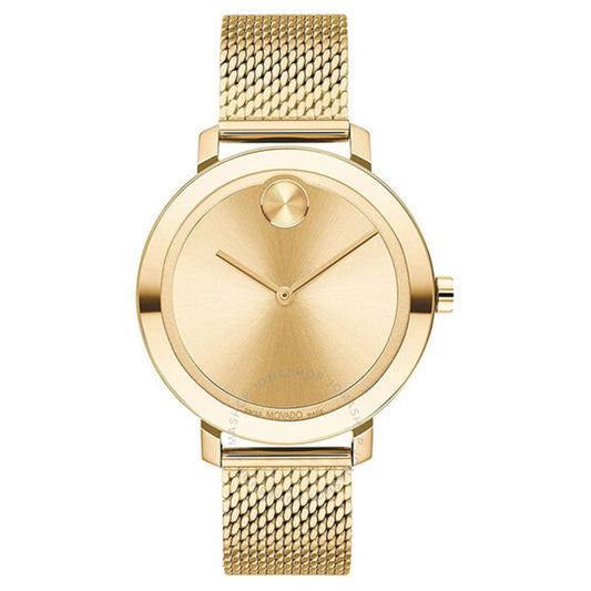 Introducing the Movado BOLD Thin Yellow Quartz 42mm Watch by Movado: a gold wristwatch featuring a minimalist design. It boasts a mesh band and a plain gold dial with two hands along with a round gold marker at the 12 o'clock position, enhancing its sleek and elegant appearance without the use of numbers on the watch face.