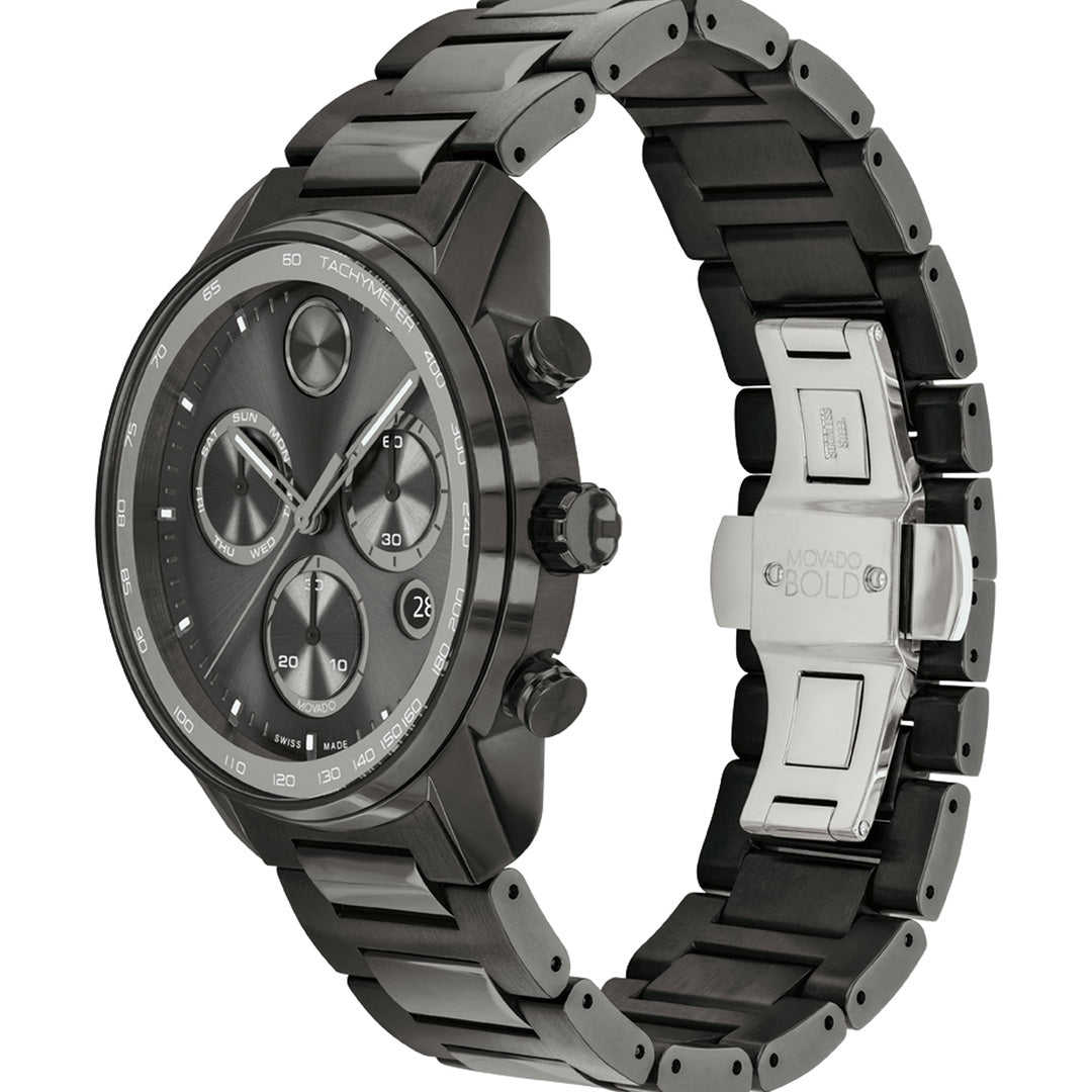 Introducing the Movado BOLD Verso Chronograph Quartz 44mm Watch—a sophisticated black timepiece featuring a metal bracelet, three subdials, and a date display. Accented with silver details and an engraved “Movado Bold” clasp, it also includes a tachymeter bezel for added functionality, seamlessly blending style and performance.